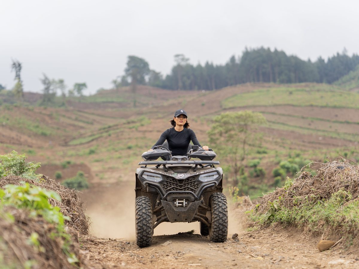 A quad bike on a farm track in the hills