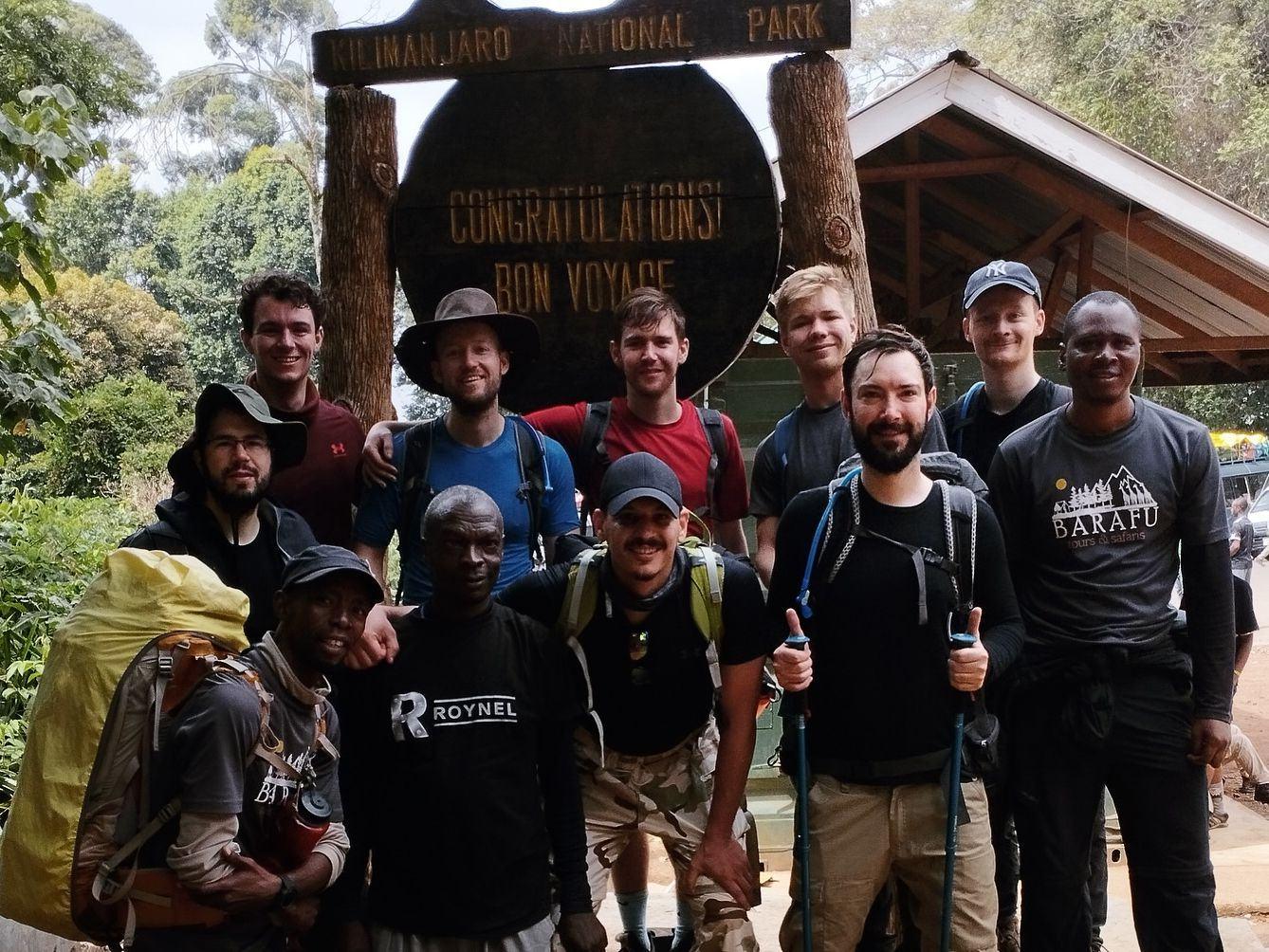 Climbers and their Barafu guide at the finishing gate